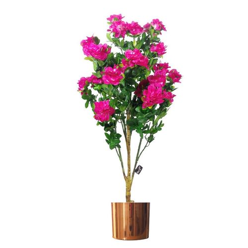 Vibrant pink flowering plant arranged in the polished copper pot for scale.