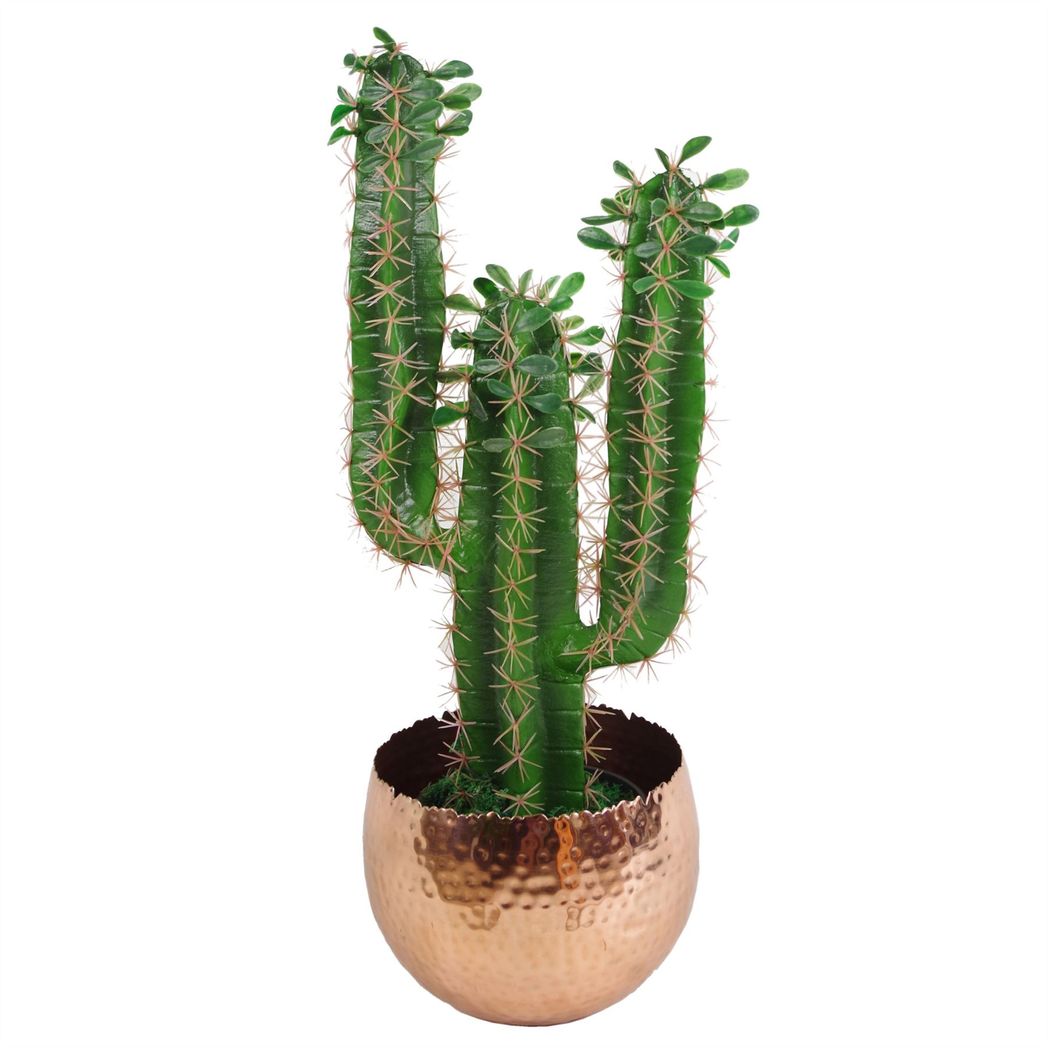 Hammered copper planter with tall artificial cactus plant.