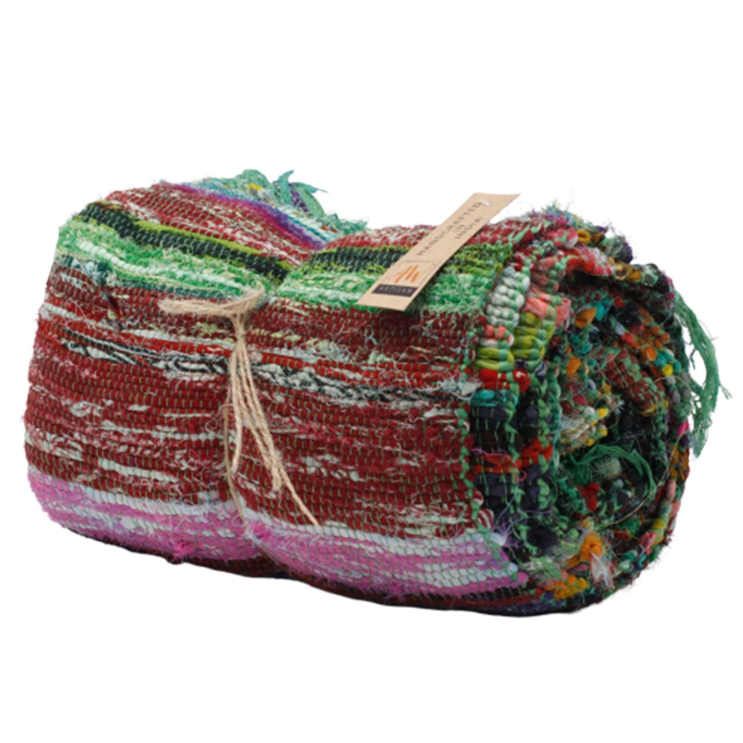 Tightly rolled luxury rag rug tied with twine, label visible.
