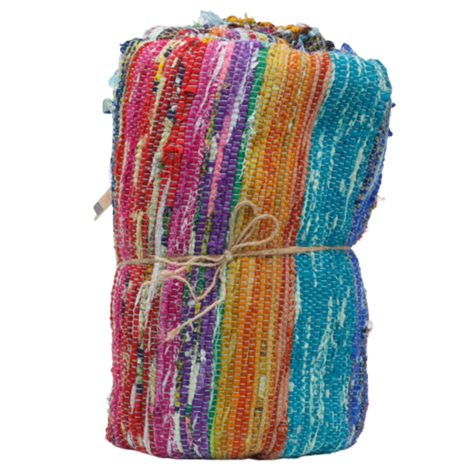 Folded luxury Indian rag rug tied with twine, showing colourful horizontal stripes and texture.