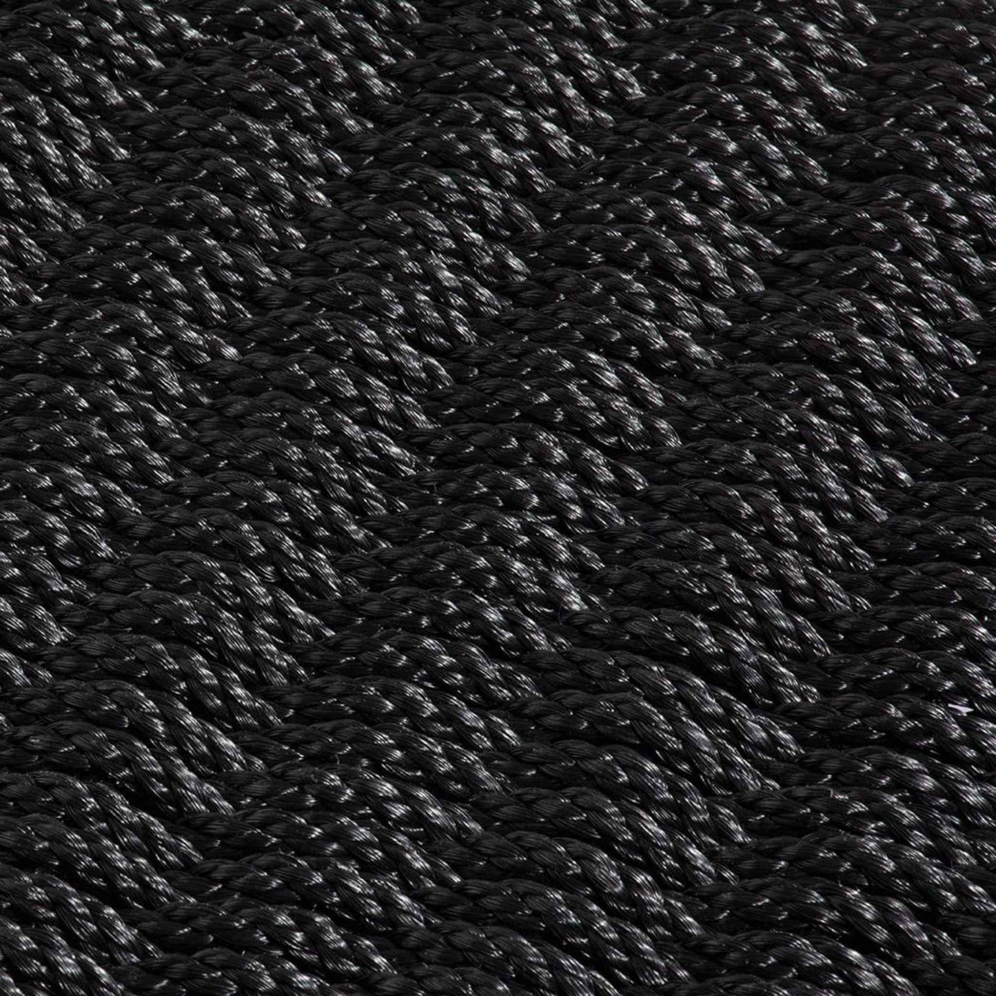 Detailed close‑up of twisted rope pattern on charcoal polypropylene doormat with woven ridges.