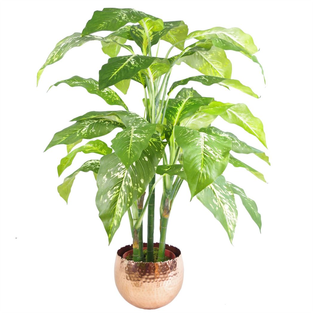 Hammered copper planter styled with a tall artificial leafy plant.
