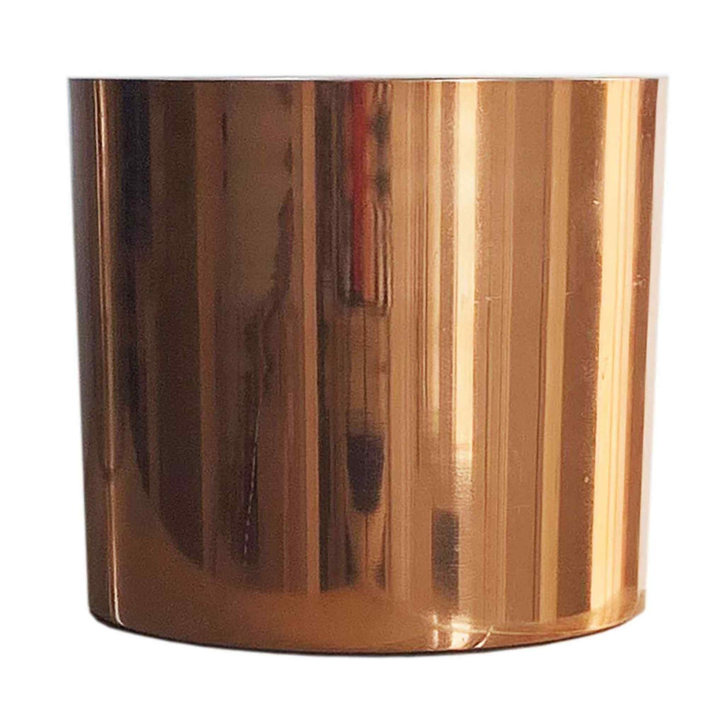 Copper metal planter pot, polished finish, cylindrical shape on a white background.