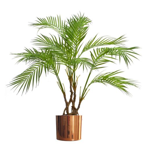 Indoor palm plant styled inside the copper planter, showing height and proportion.