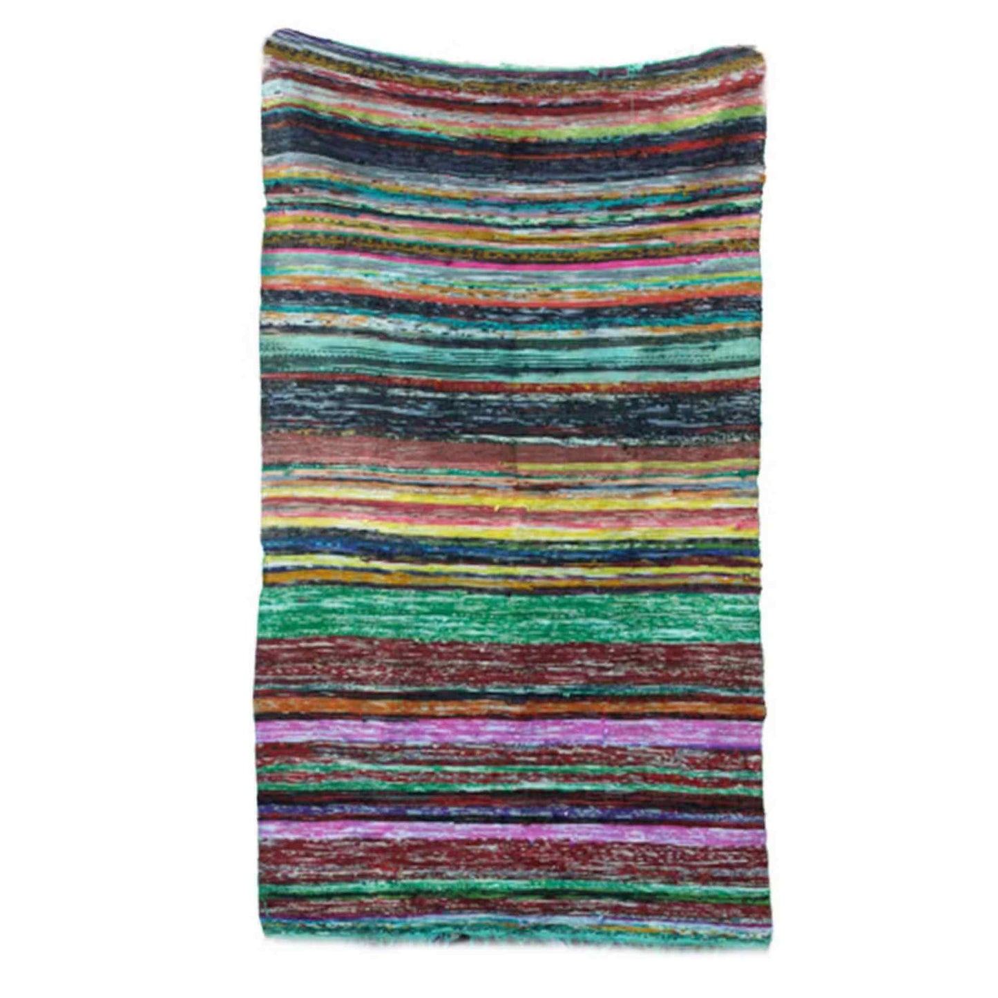 Full view of a rectangular multicoloured Indian rag rug with green edges.