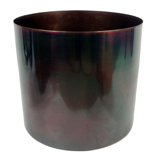 Iridescent metal planter with a polished rainbow finish, shown against a white background.