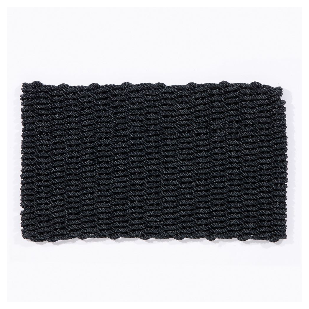 Full overhead view of rectangular navy doormat on white background.