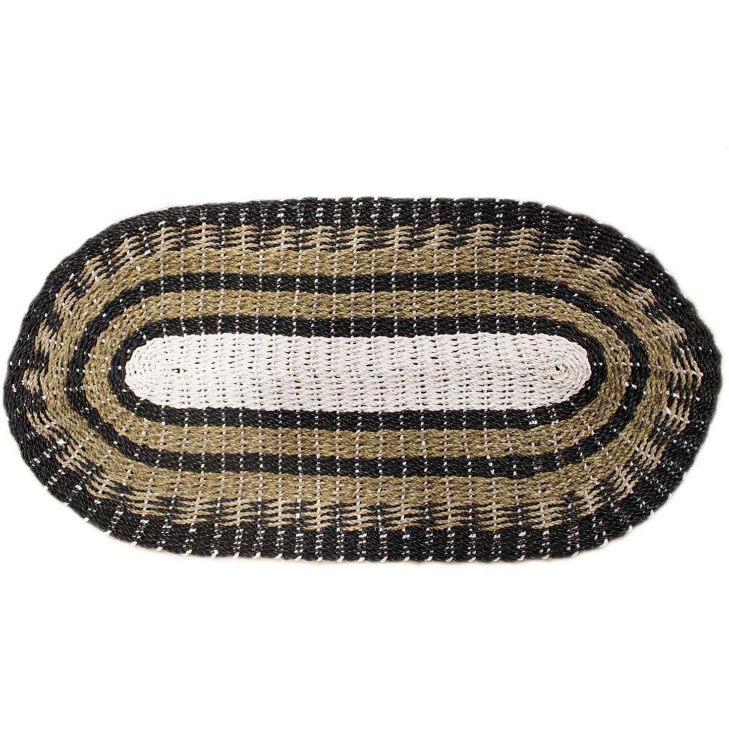 Studio shot of an oval black, tan and white seagrass rug, 60x120cm, on a white background.