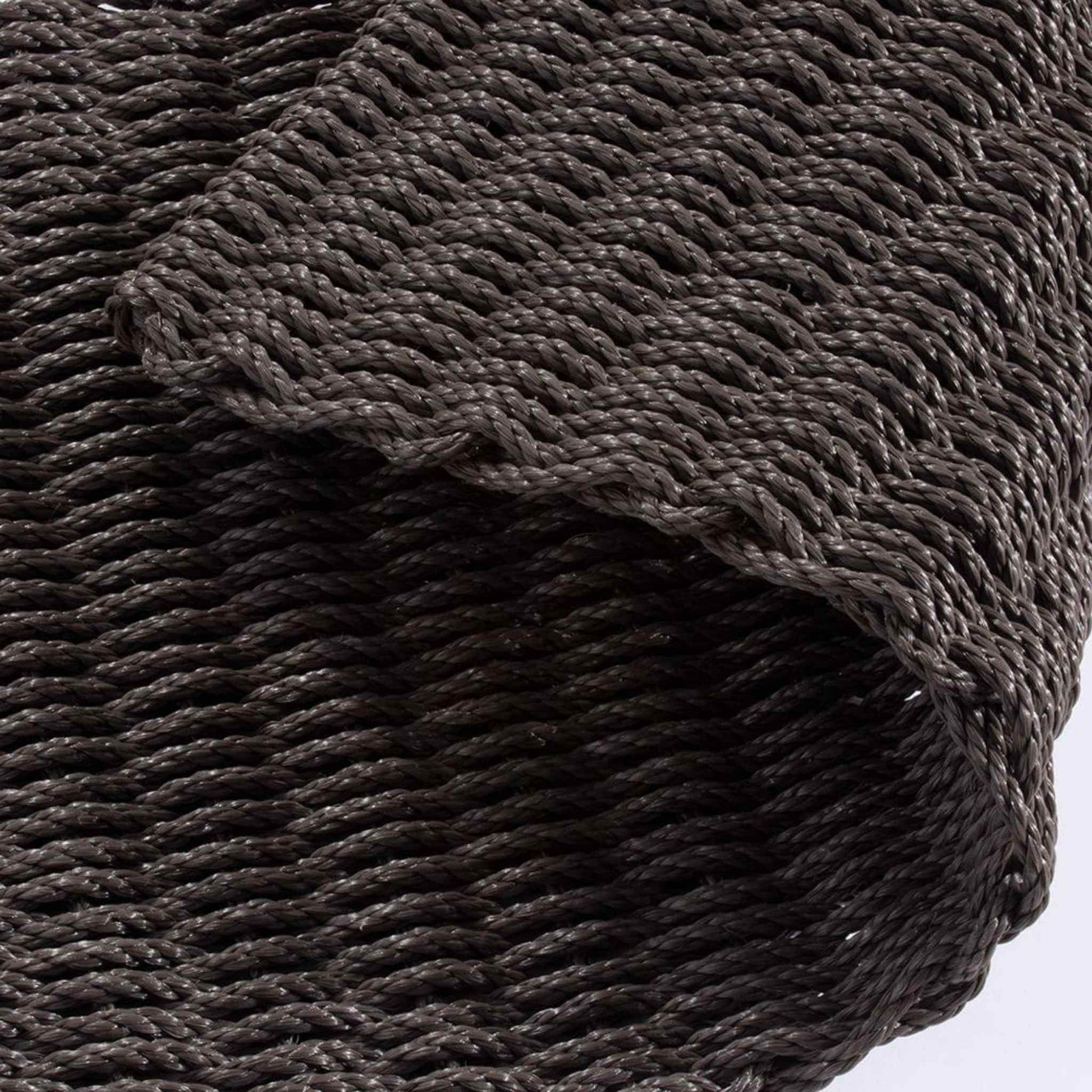 Didsbury doormat partially folded to show flexibility and durable weave.