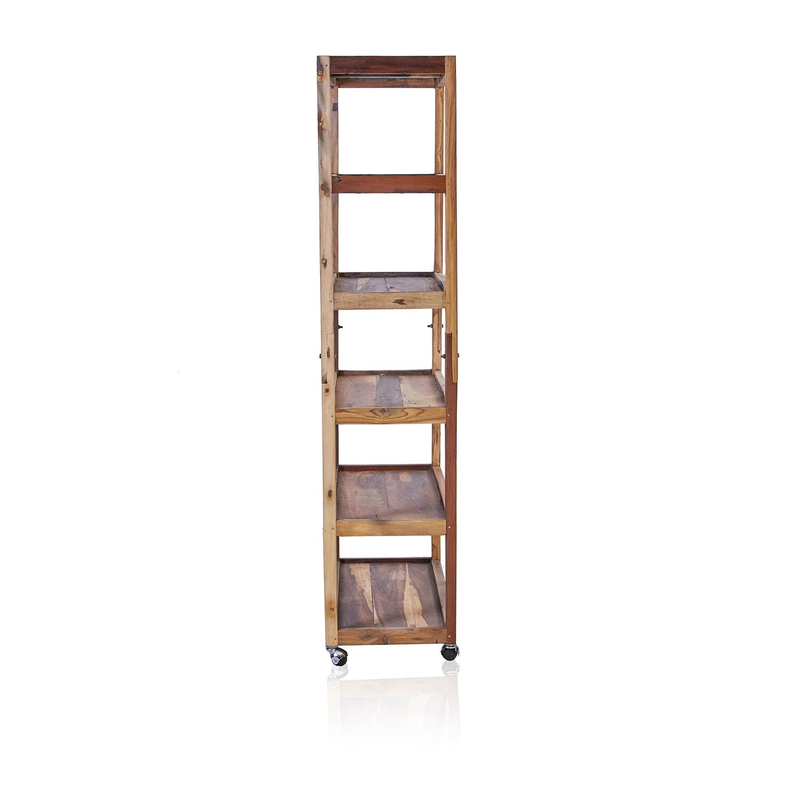 Side view of a tall recycled teak shelving unit with six shelves on castor wheels.