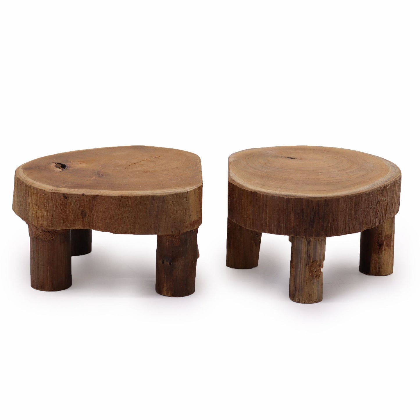Two small wooden pedestal stands with organic edges and visible wood rings, side by side on white.