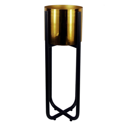 Tall black metal stand with gold metal planter, empty, against a white background.