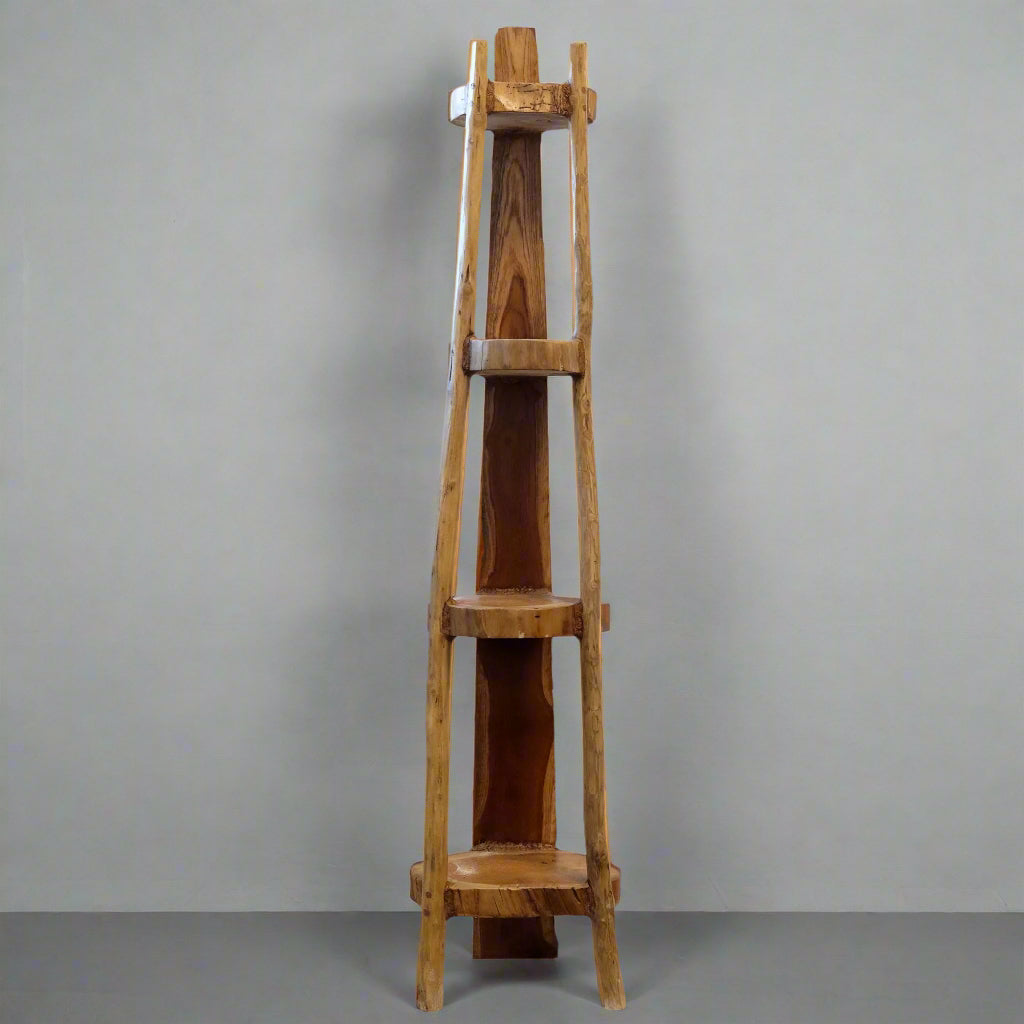Tall natural teak corner shelf unit with four fixed shelves, front view.