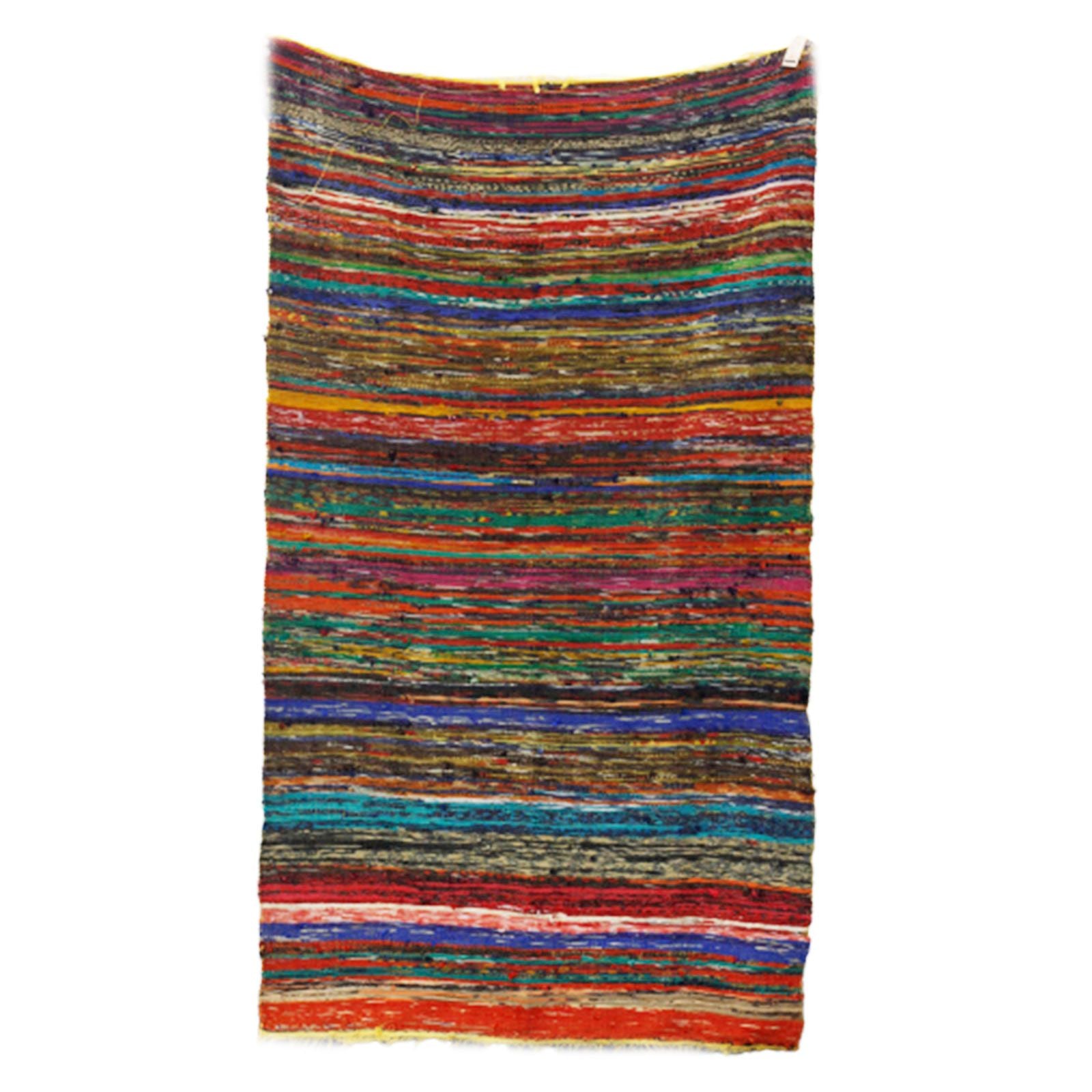 Full rug shown hanging vertically to display full pattern and size.