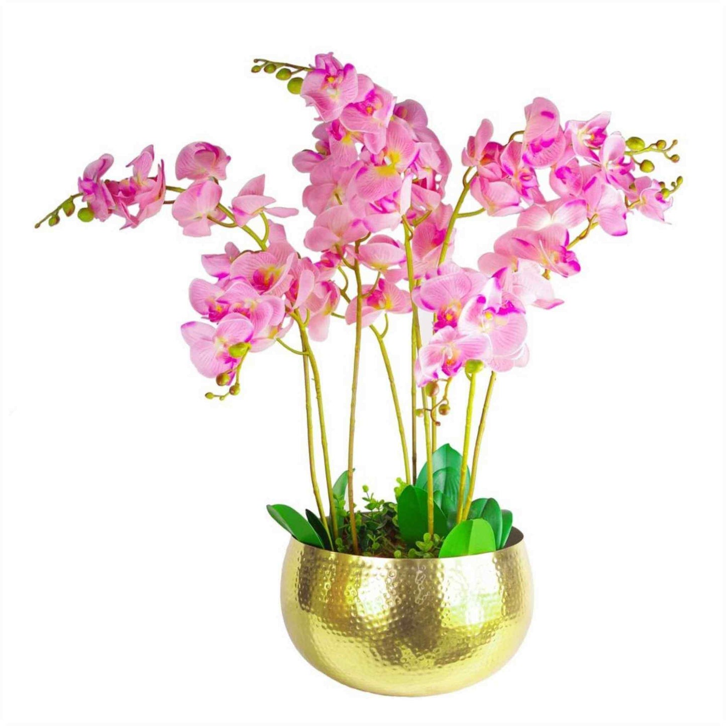 Large hammered gold metal bowl planter displaying pink orchids and greenery, indoor decorative setup.
