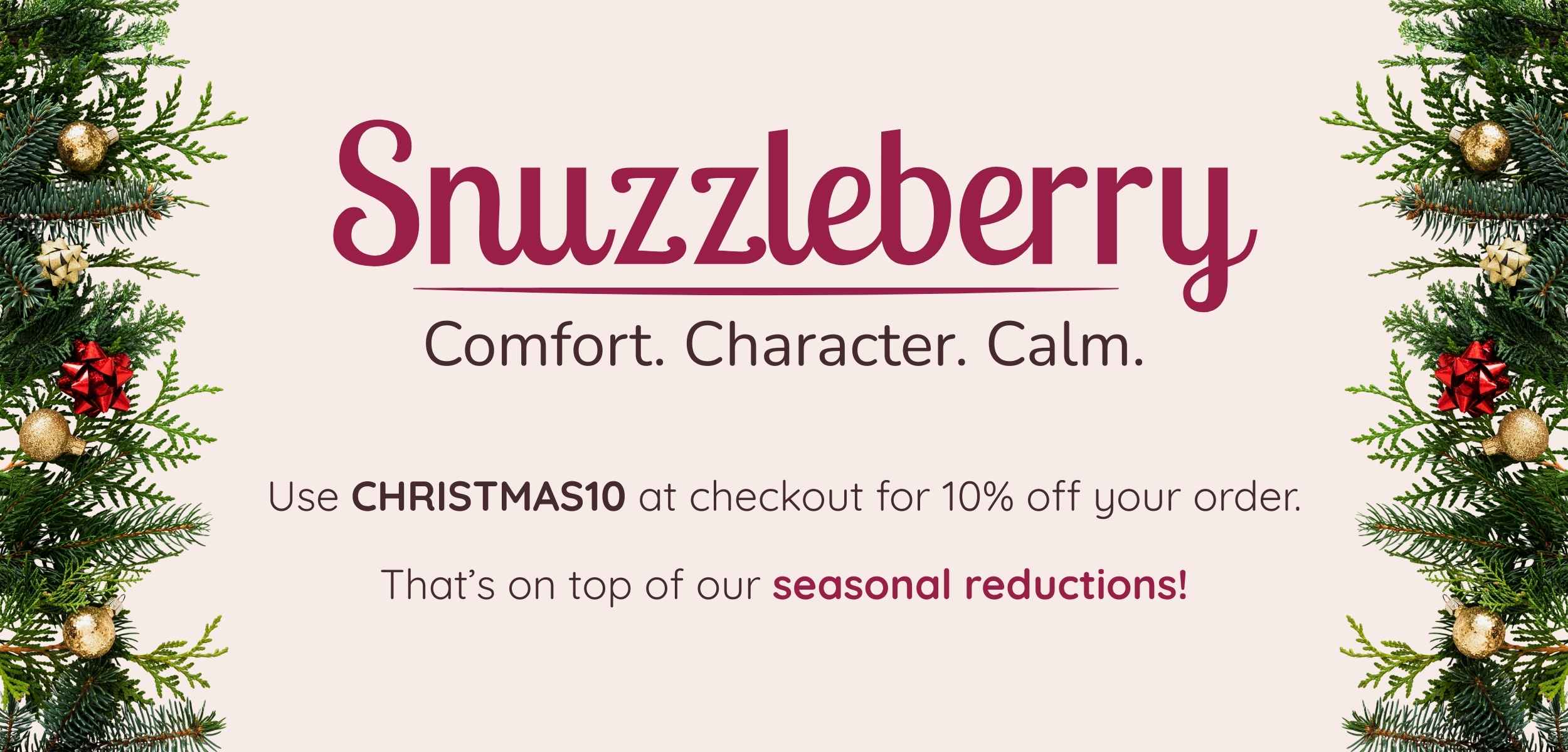 Snuzzleberry Christmas banner with festive greenery, the brand logo, and a discount code for 10% off.